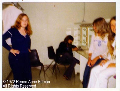 Joey Molland signs an autograph backstage, July 22, 1972