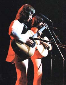 Pete Ham and George Harrison perform Here Comes The Sun at The Concert For Bangladesh at Madison Square Garden (photo from LP booklet)
