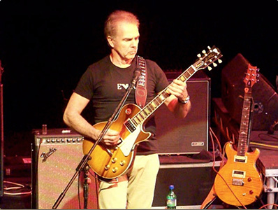 Dave Jenkins playing lead guitar on "Midnight Sun", April 24, 2013, video still by Tom Brennan
